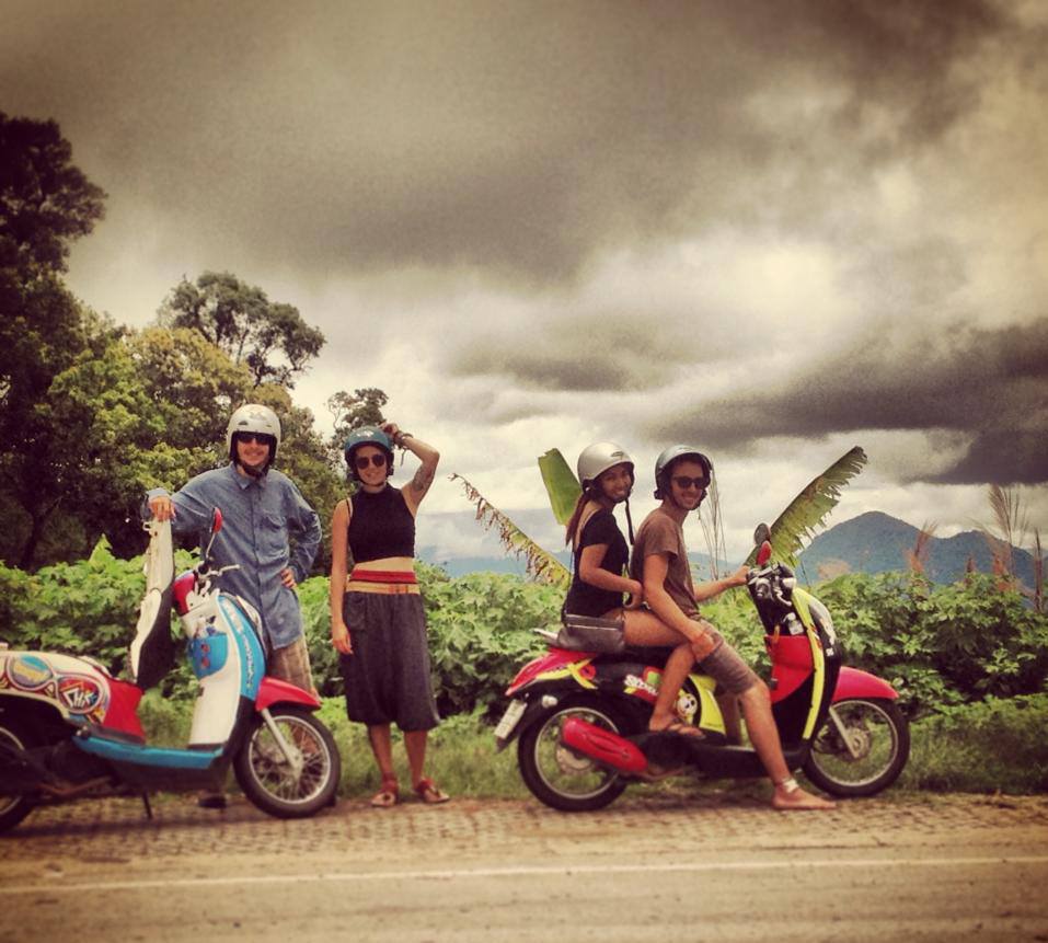 Riding scooters in Pai, Thailand