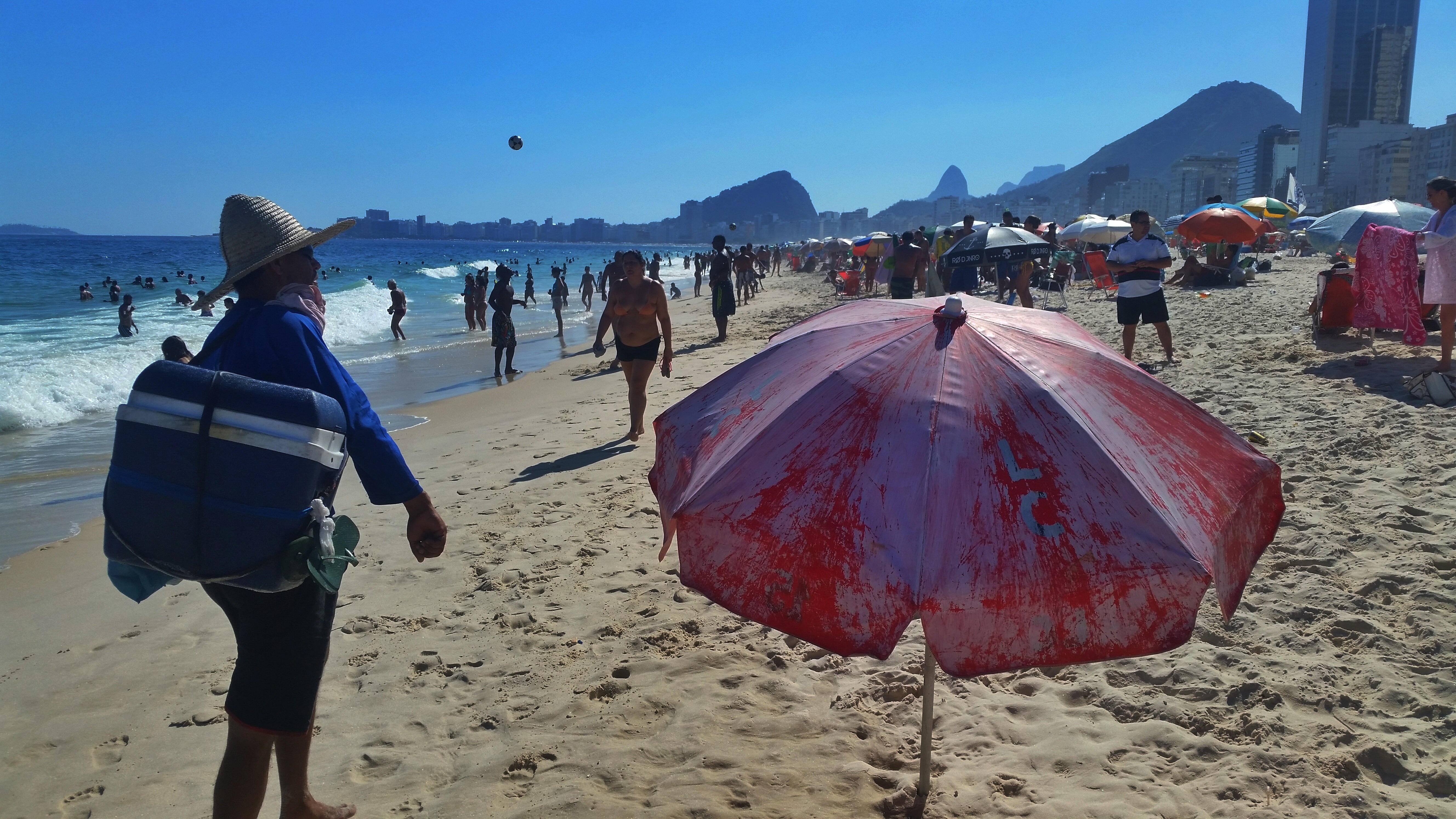 Beach vendors selling tea, acai, salgadas, caipirinhas and more at Copacabana Beach, Brazil