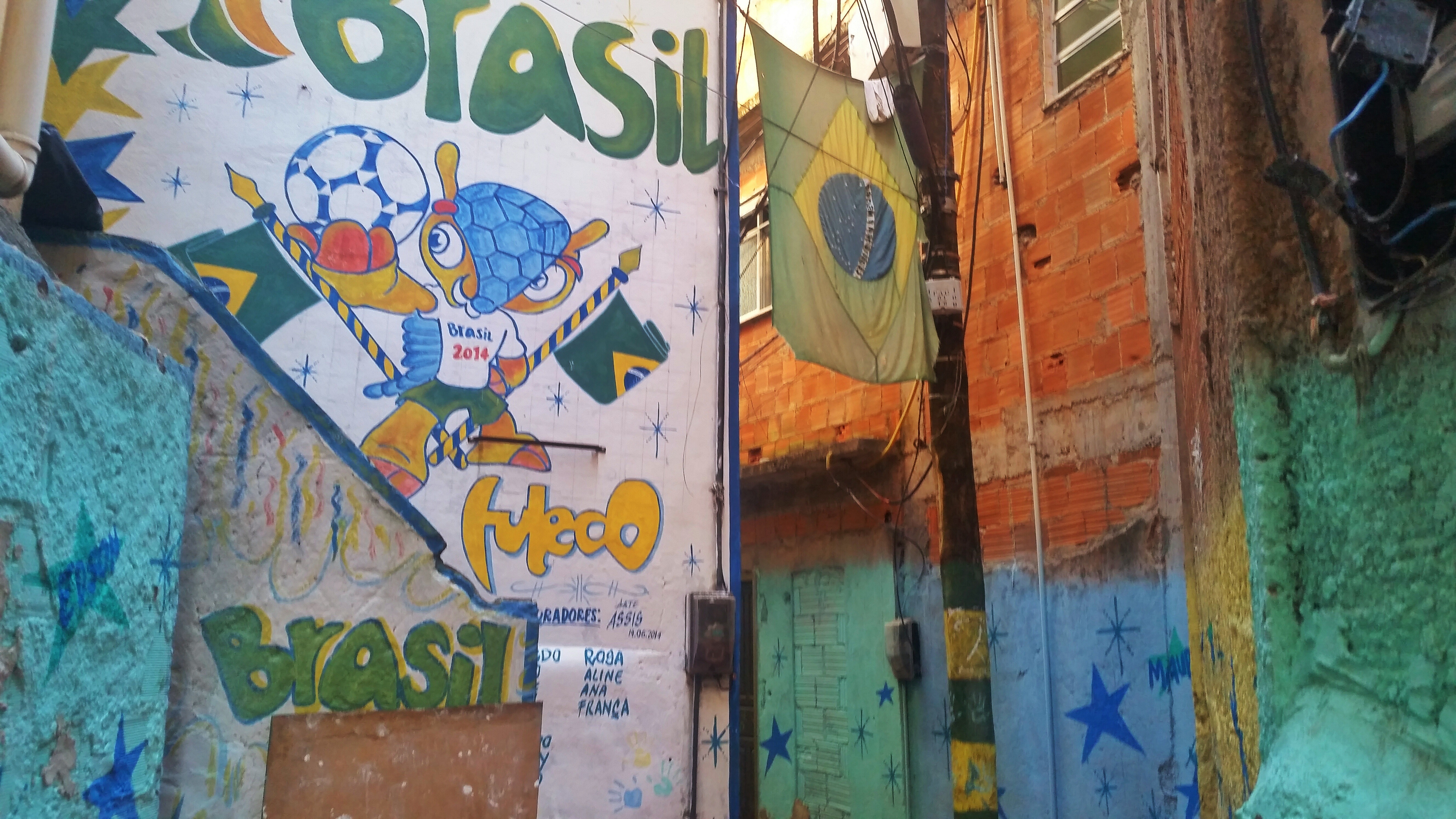 Is it safe for tourists to visit the favelas in Rio de Janeiro? - Little colourful alleyways in Chapéu Mangueira favela, Rio de Janeiro, Brazil