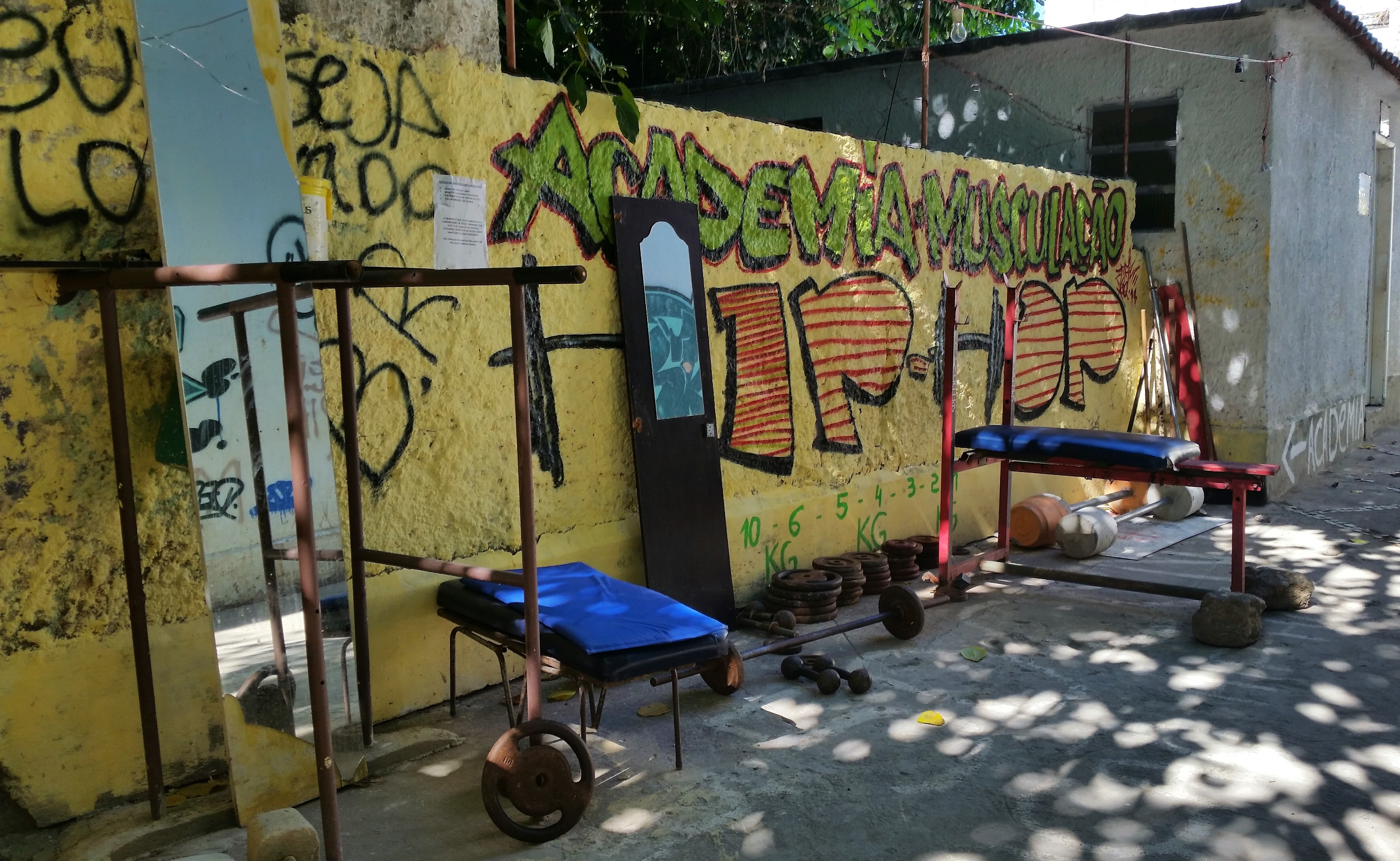 Is it safe for tourists to visit the favelas in Rio de Janeiro? - The local gym inside Chapéu Mangueira favela in Rio de Janeiro, Brazil