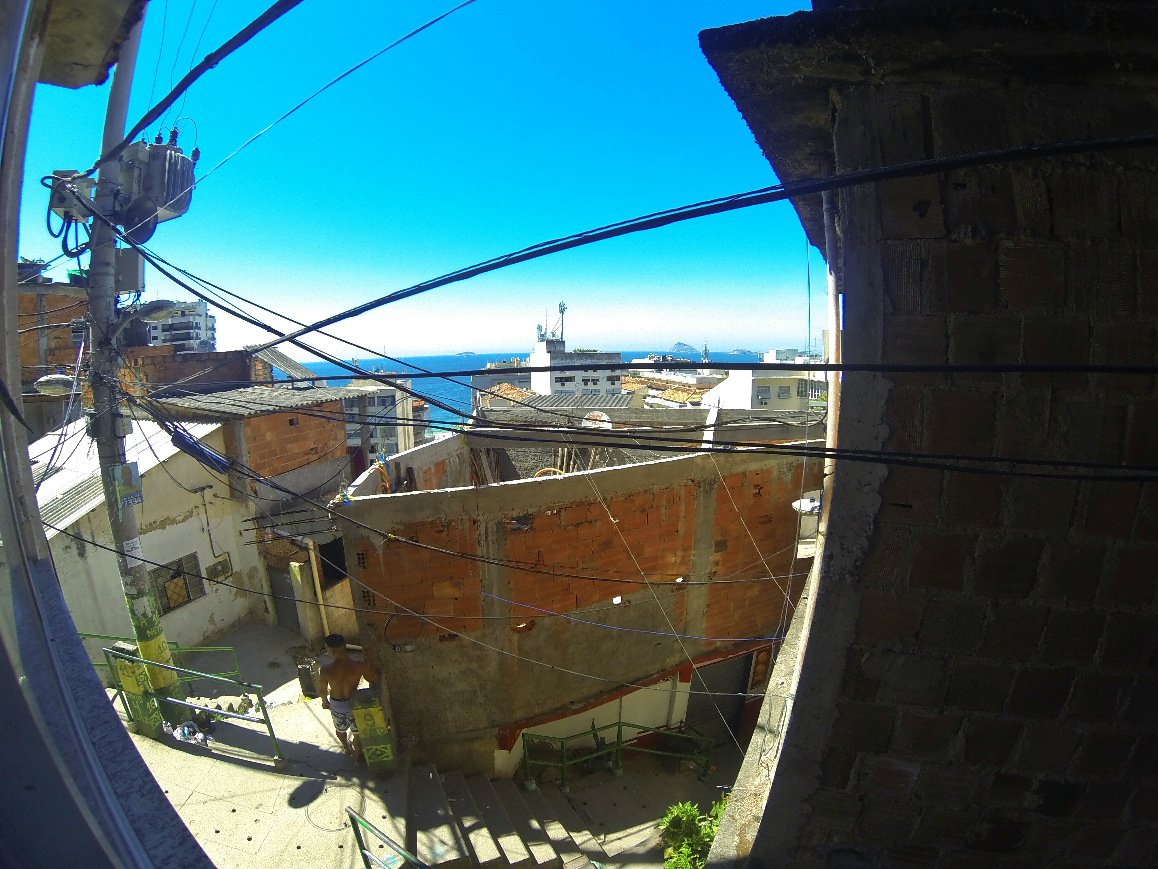 Is it safe for tourists to visit the favelas in Rio de Janeiro? This is the view from the bathroom of our guesthouse in a favela!