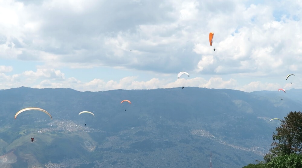 Watching the paragliders in San Felix, Colombia | Paragliding in Medellin, Colombia: How To Have A Safe And Epic Ride