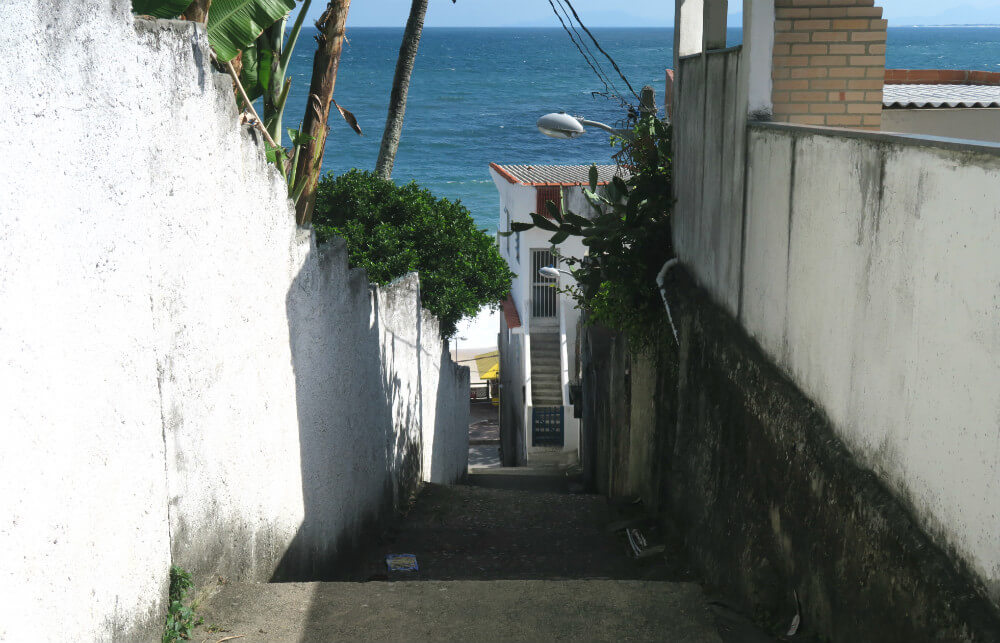 The beginning of the walk | Barra de Guaratiba Rio de Janeiro | At the bus stop | The unique view over Rio de Janeiro | How To Get To Pedra Do Telegrafo, Rio De Janeiro (To Hang Off The Cliff)