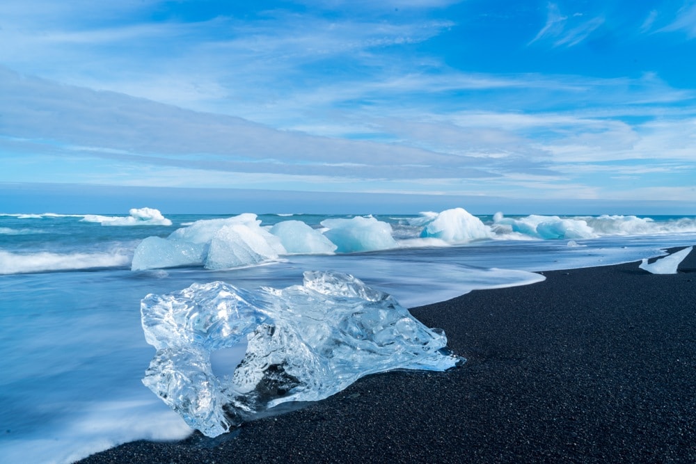 Icebergs washed up on the shore of Diamond Beach, near the glacier lagoon Jökulsárlón-Insider’s Guide: Budget Iceland travel tips
