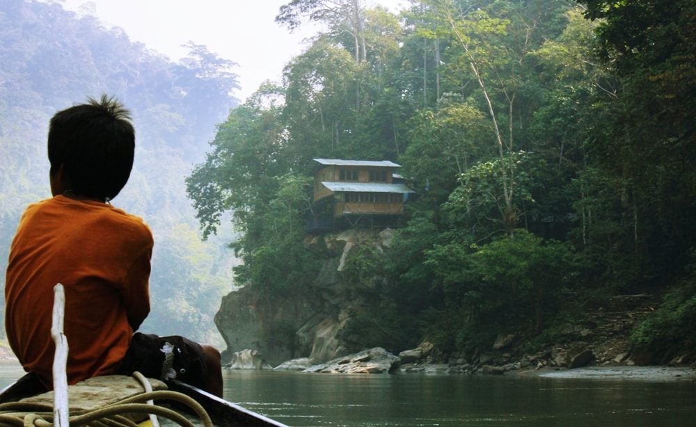 on a boat following Madre de Dios river in Manu National Park - Insider’s Guide: Essential Peru Travel Tips You Need To Know Before Visiting