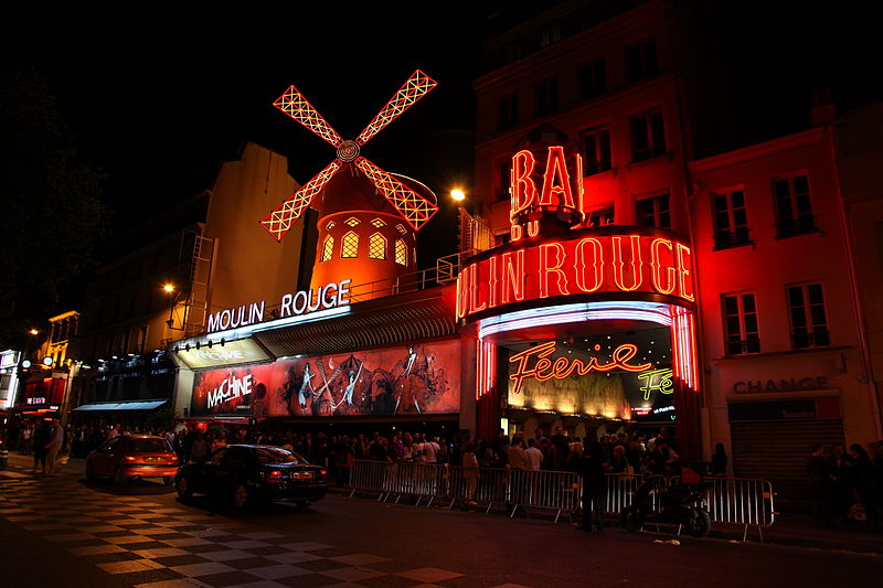 Shades of the World Series: Red lights lighting up Le Moulin Rouge at night