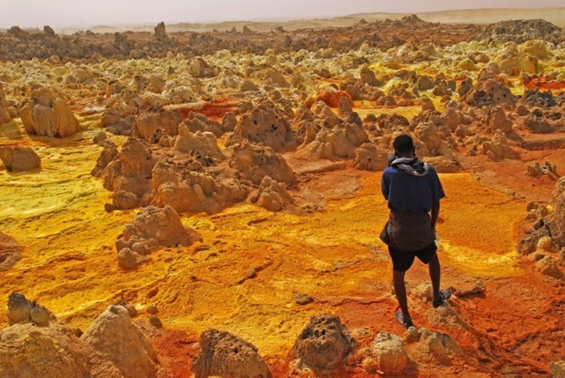 Shades of the World Series: slightly-pointed rocks surrounded the dry, orange earth in Dallol, Ethiopia