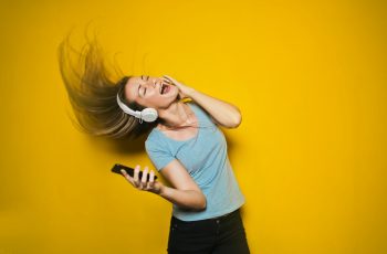 photography-of-woman-listening-to-music-761963